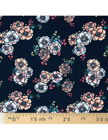 Lycra badpakstof - Bloemen op marineblauwe achtergrond