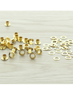 Zakje met 100 oogjes met ringen 4 mm - Goud