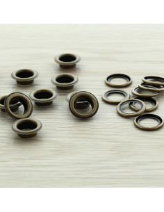 Zak van 100 oogjes met ringen 11 mm - Antiek messing