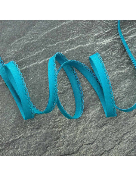 Donker turquoise gevouwen biaisband met stippen