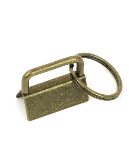 Set van 2 sleutelhangerclips en riem - Antiek