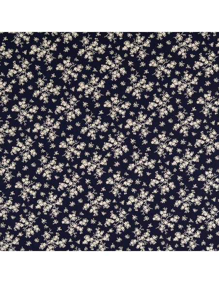 Vintage katoenen stof - Marineblauwe achtergrond met kleine ecru bloemen