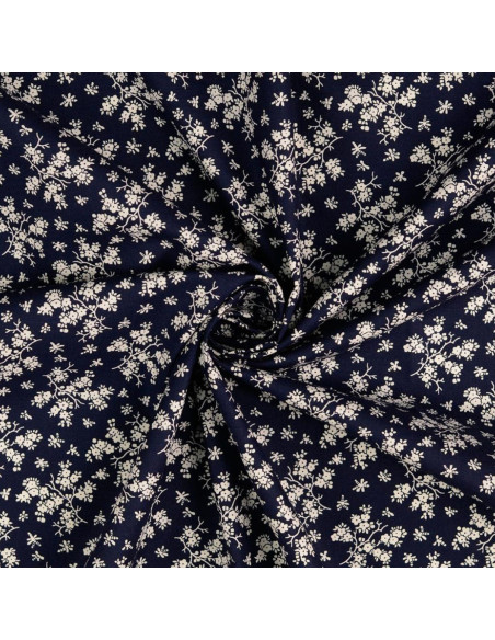 Vintage katoenen stof - Marineblauwe achtergrond met kleine ecru bloemen