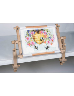 Draaibaar frame voor wandtapijt met clipsysteem