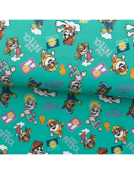 Jersey stof Paw Patrol - Zon op turquoise blauwe achtergrond