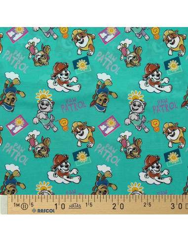 Jersey stof Paw Patrol - Zon op turquoise blauwe achtergrond