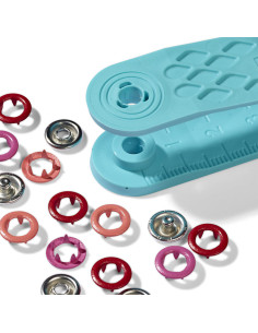 Doos met 21 drukknopen in rood, koraal en fuchsia met 8 mm gereedschap. 2