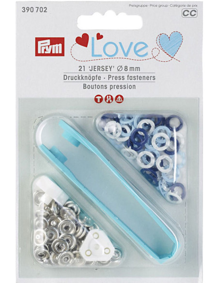 Doos met 21 drukknopen in wit, lichtblauw en marineblauw met 8 mm gereedschap.