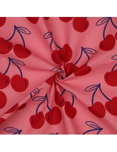 Waterafstotende katoenen stof met grote kersen - Roze