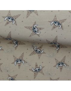 Jersey stof Lilo & Stitch - Beige sterren