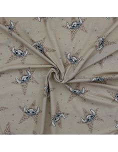 Jersey stof Lilo & Stitch - Beige sterren 2