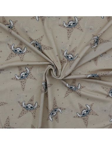 Jersey stof Lilo & Stitch - Beige sterren