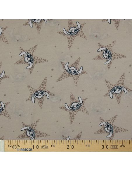 Jersey stof Lilo & Stitch - Beige sterren
